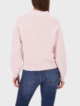 Basic left-left sweater in light rose, showcasing a minimalist design perfect for everyday outfits.