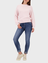 Basic left-left sweater in a soft light rose color, offering a versatile addition to any wardrobe.
