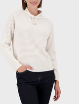 Basic Monari ribbed sweater in almond color, featuring a classic design and comfortable fit for casual wear.