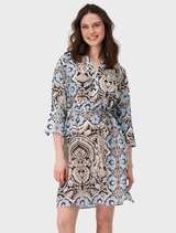 Black print women's dress adorned with blue and white paisley designs, ideal for beachwear.