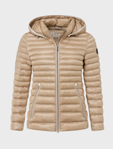 A beige quilted jacket from Bern, elegantly displayed to showcase its design and fabric texture.