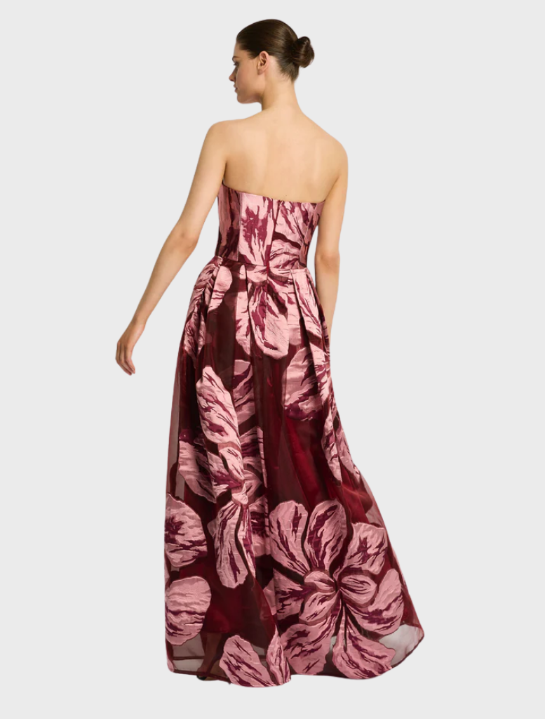 Beautiful strapless gown designed with a lively floral pattern, ideal for special events.