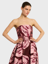 Chic strapless gown crafted from a floral print fabric, offering a fresh and fashionable look.