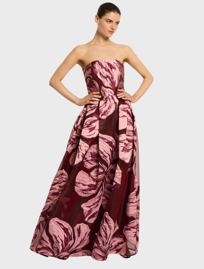 Strapless gown with a delicate floral print, highlighting a stylish and feminine silhouette.