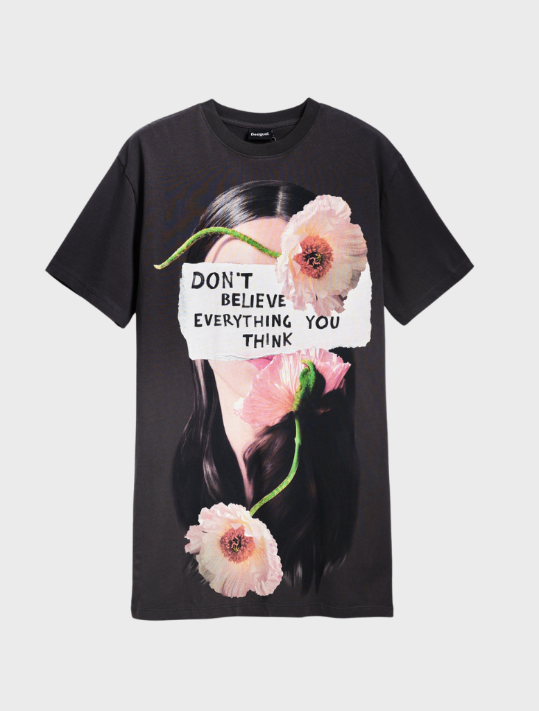 A woman in a t-shirt featuring the phrase "don't live everything to" inspires viewers to consider their life decisions.

