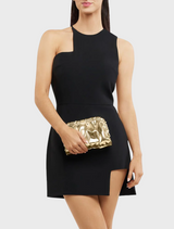 A sleek clutch bag in shiny gold fabric, featuring a metallic finish that adds a touch of glamour to any outfit.