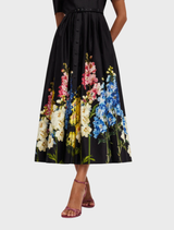 Stylish Bianca midi dress with short sleeves, featuring an ebony snapdragon print, suitable for diverse occasions.
