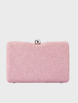 Stylish pink clutch bag with a chain strap, known as the Birdie Textural Handle Bag.