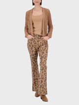 Biscotti-colored blouse adorned with appliqued flowers, showcasing a delicate and elegant design for casual wear.
