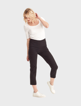 Black Acrobat Eyelet 7/8 pants displayed on a white background, showcasing their stylish design and fabric texture.