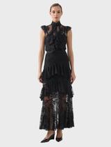 Elegant black sleeveless top from Antoinette, perfect for layering or wearing alone.