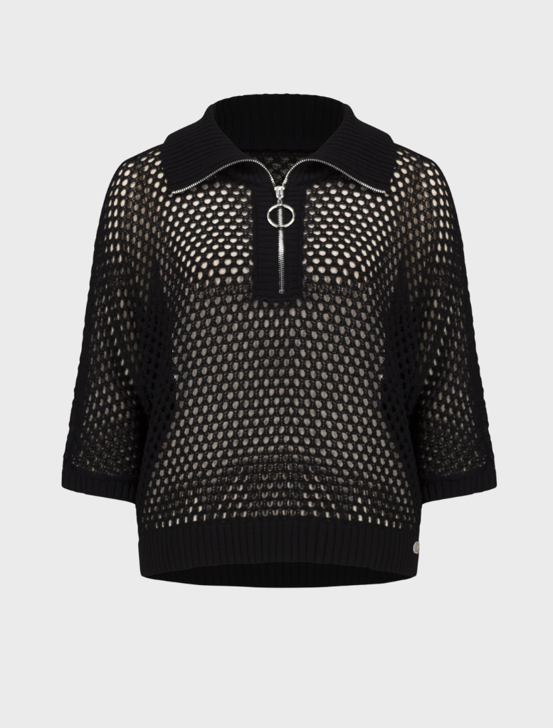 Black top displayed on a hanger, illustrating a chic and understated design.