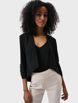 Black tuxedo overpiece, a timeless choice for formal events and special occasions.