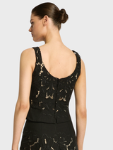 Colette Bustier in black, featuring a chic crop top design with intricate lace detailing for a fashionable look.