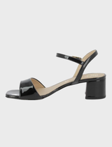 Stylish black sandals with a minimalist design, featuring adjustable straps and a cushioned footbed for all-day comfort.