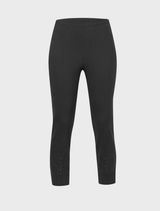 Black 7/8 pants with eyelet embellishments, illustrating a fashionable choice for casual or semi-formal wear.