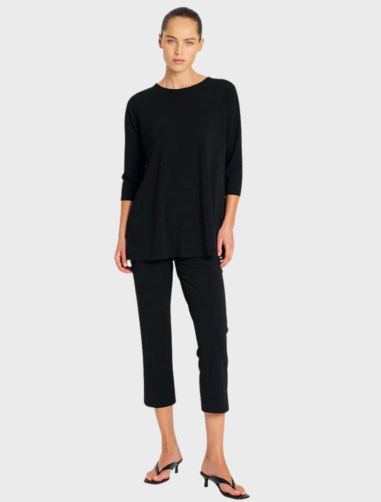 Black clothing set featuring a soft, stretchy top and pants for a comfortable fit.