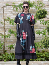 Stylish black floral dress with a unique weasel print, ideal for both day and evening wear.