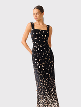 Black and gold embellished gown with a square neckline, sleeveless design, and a fitted floor-length silhouette for evening events.