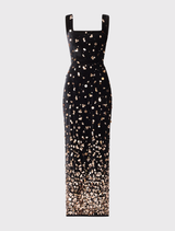 Elegant black velvet gown with gold detailing, square neckline, adjustable straps, and a fitted silhouette for formal occasions.