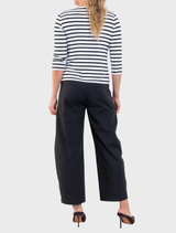 Black Barrel Leg Pant crafted from Gravitene, featuring a smooth waistband, elastic back, and practical side pockets for style.