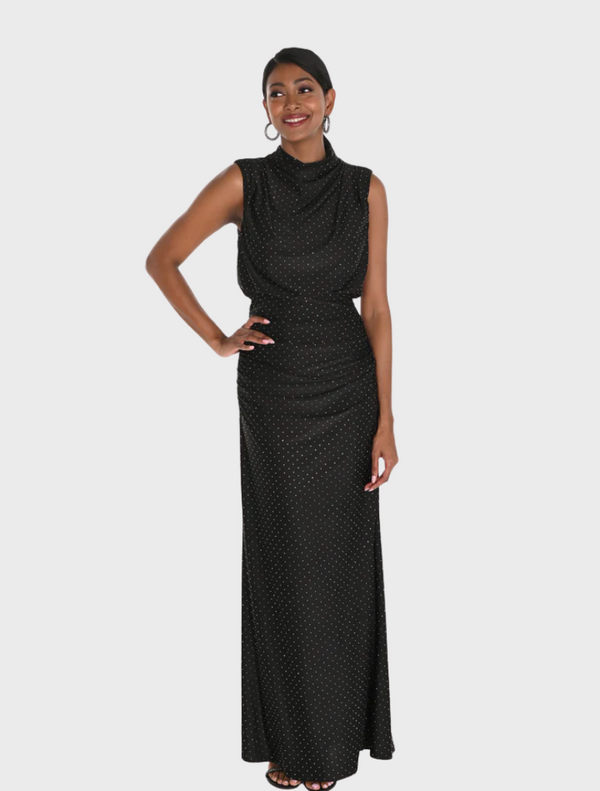 Black dress with white polka dots, featuring a fitted bodice and flared skirt, displayed on a hanger against a neutral background.