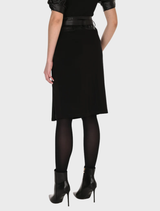 Elegant black knit skirt, tailored for a polished look, ideal for office wear or special occasions with all-day comfort.