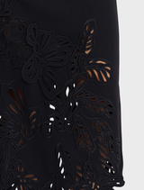 Stylish black Lessonhall Maxi Dress with a graceful silhouette, perfect for any occasion or seasonal event.