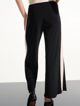 Chic black pants with moonstone highlights, offering a modern look for various occasions.