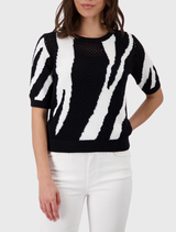 Elegant black ajour knit sweater with a tiger intarsia design, round neckline, short sleeves, and a modern regular fit.