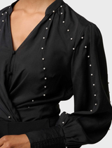 Elegant black cupro stretch shirt with embellishments by Marcela Pearl, perfect for versatile styling.