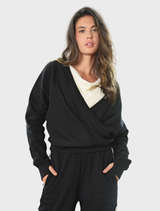 Black "Pirouette & Forget" sweatshirt, showcasing a trendy design ideal for casual wear and dance lovers.