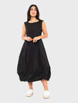 Elegant black poplin dress adorned with a distinctive print, perfect for casual or formal events.