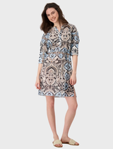 Women's beach tunic dress featuring blue and white paisley patterns on a black background.