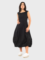 Stylish black poplin dress with an eye-catching print, ideal for adding flair to any wardrobe.