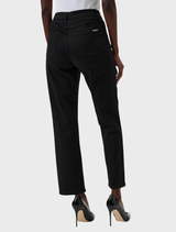 Black slim fit stretch jeans laid flat, highlighting their tailored look and comfortable fabric.