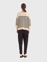 Black Soundtrack Pant with a relaxed fit, elastic back waistband, and adjustable cuffs, combining comfort and modern utility style.
