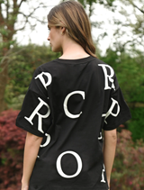 Black T-shirt showcasing the title of the game in eye-catching typography.