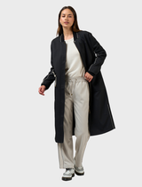 Black tactical coat with a practical design, equipped with pockets for storage and made for outdoor or tactical use.