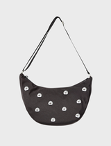 Stylish black dome bag, featuring a smooth finish and practical handles, perfect for everyday use.