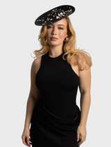 Morgan & Taylor's black fascinator showcases a structured design with floral details, ideal for chic racewear and events.