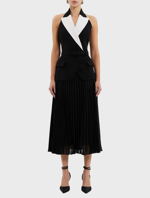  A stylish black and white dress with a prominent white collar.