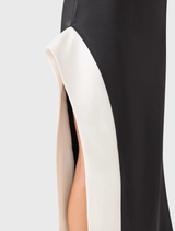 Chic black-and-white asymmetrical gown from Elliatt, crafted for evening events, emphasizing elegance with minimalistic styling.