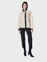 A black fabric featuring a window pane check pattern, highlighting a timeless and elegant style.
