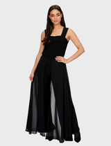 Black woven pants arranged neatly, illustrating their elegant design and suitability for both casual and formal settings.