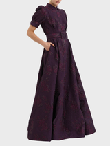 Stylish Afina short sleeve gown in blackberry, showcasing a flattering fit and sophisticated design for evening wear.