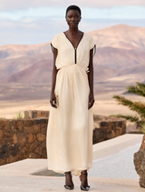 Ecru satin viscose dress with V-neck, black bias binding, and adjustable tie at the back for a refined, elegant look.