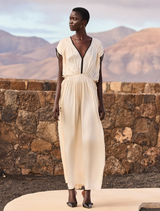 Ecru satin viscose dress with V-neck, black bias binding, and adjustable tie at the back for a refined, elegant look.
