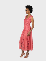 Blossom-colored Willow V-neck cocktail dress with a stylish godet design, perfect for formal occasions.