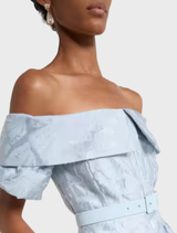 Bridal Anneli's blue cotton-blend brocade gown, showcasing a classic design perfect for a wedding celebration.